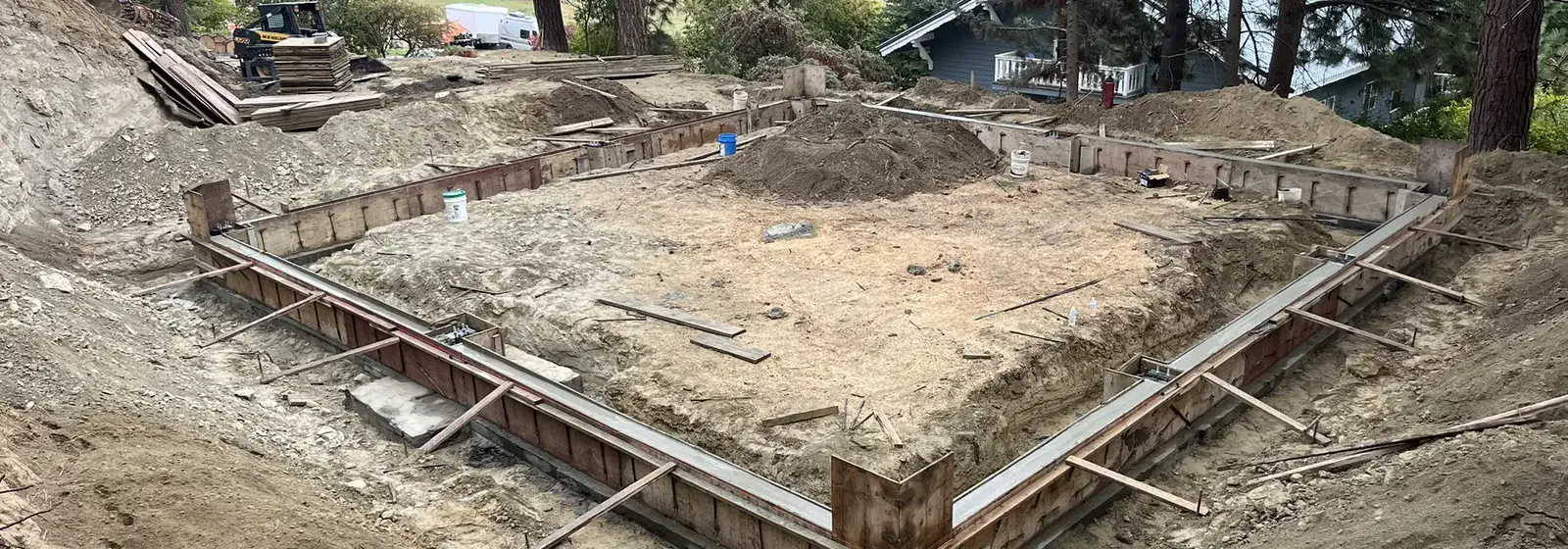 Site prep and concrete foundation work on a North Idaho building pad